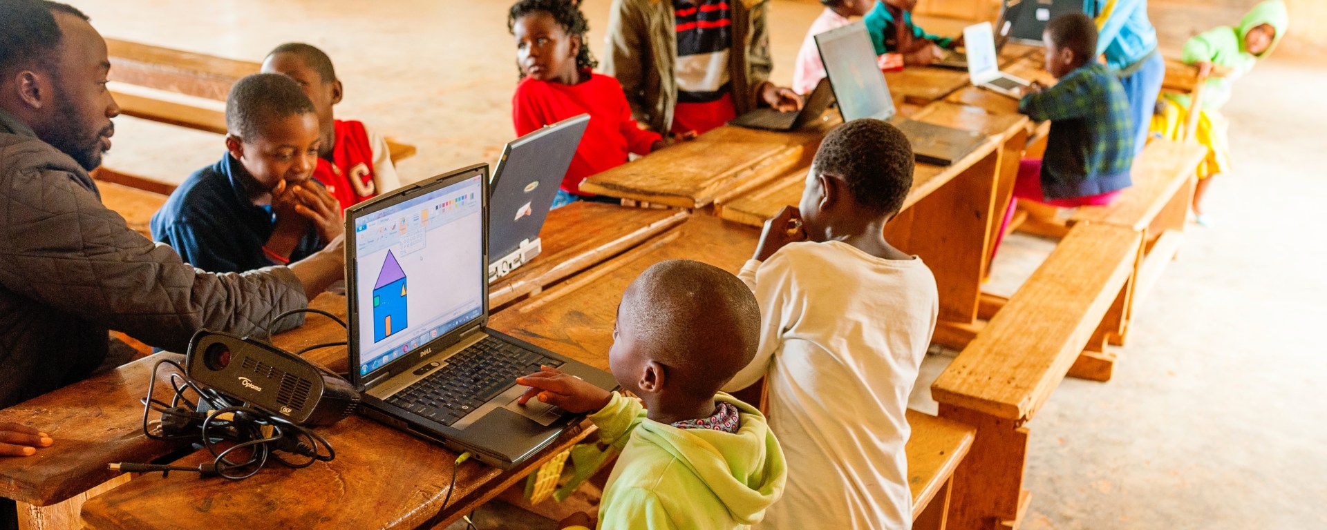 School children with computers in Africa