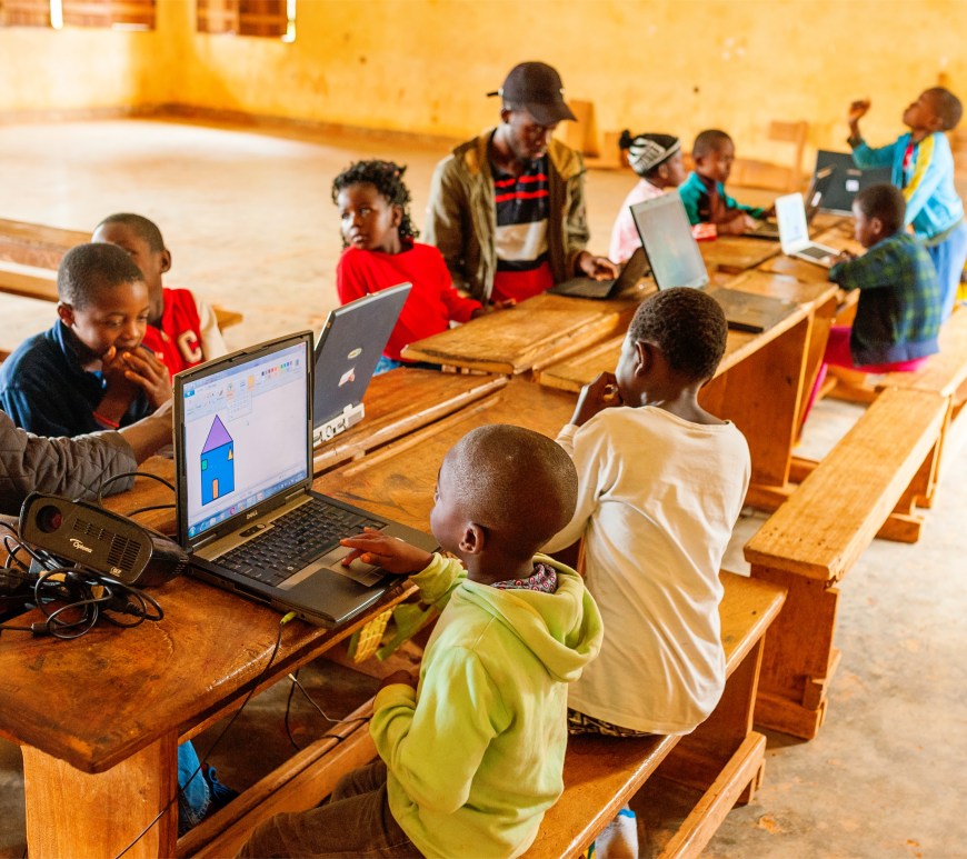 School children with computers in Africa