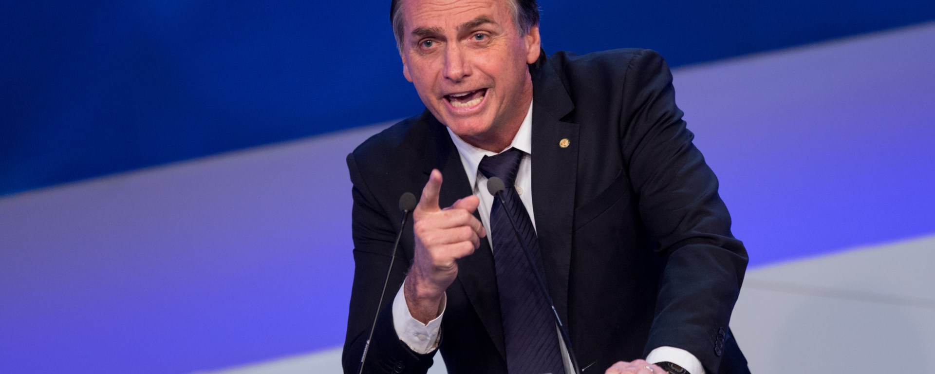 Jair Bolsonaro giving a speech and waving his finger